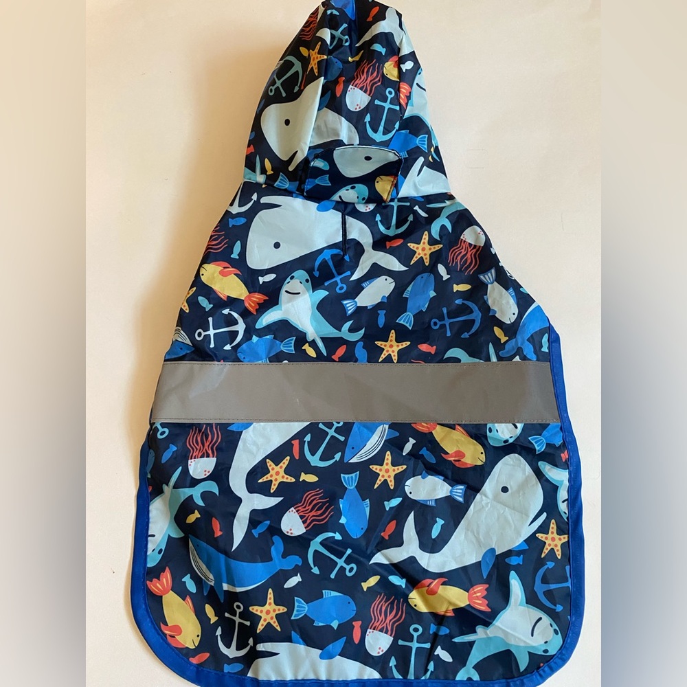 Doggy raincoat with hood and ocean-theme print